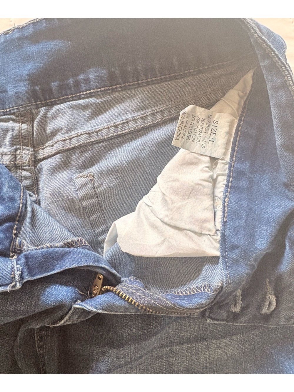 Blue Distressed Fringe Hem Women's Denim Shorts - Picture 2 of 4